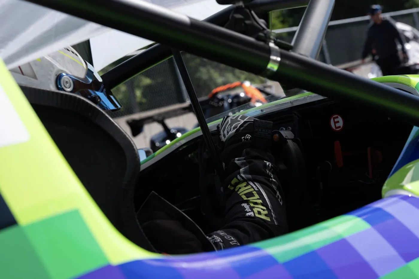 Cockpit of the shopify Racing powered by TWOth car in the paddock at Calabogie
